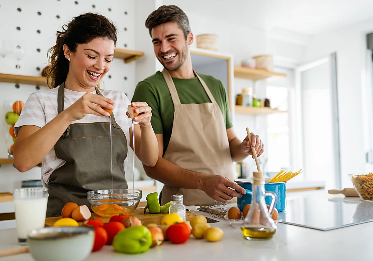 couple cooking dinner